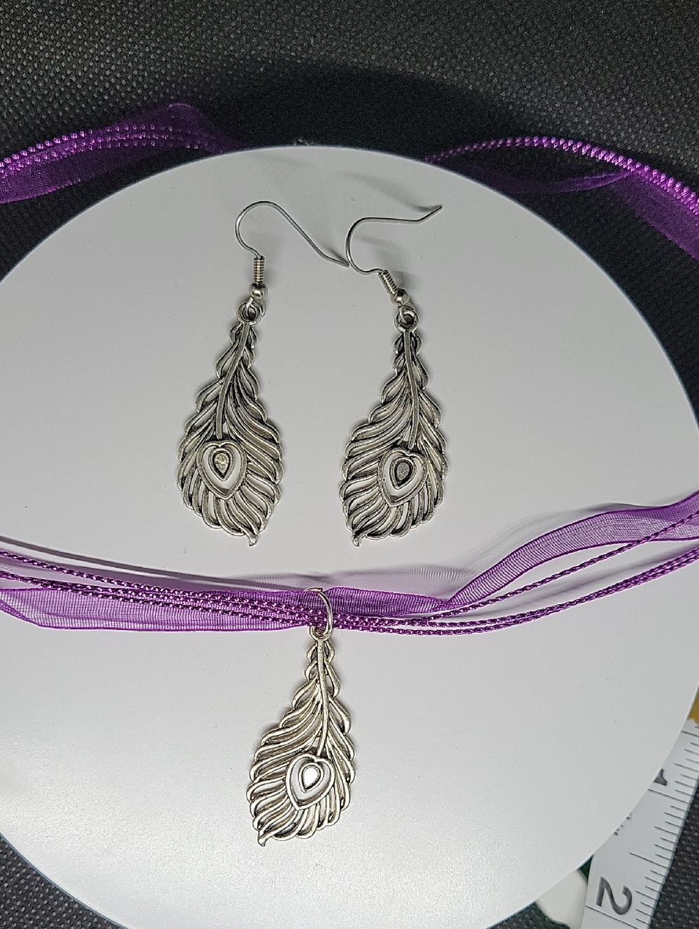 Silver Peacock Feather Earrings in Silver